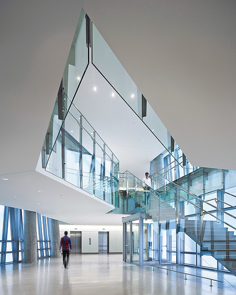 A person walking in a large building.